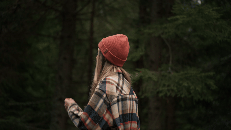 Nature Bathing in New Zealand, Girl walking through forest